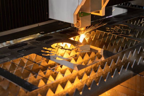 istock Laser cutting machine for metal sheet with melted metal sparks 1438221590