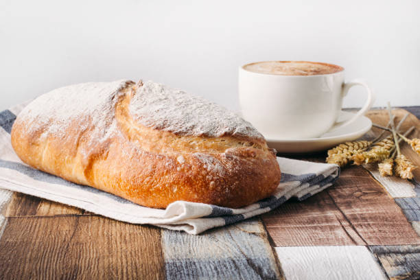 istock fresh loaf of bread and coffee 1438222057