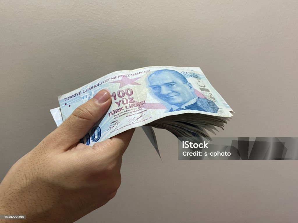 Turkish banknotes, Turkish money, Turkish lira, a hand holding Turkish banknotes Turkish Lira Stock Photo