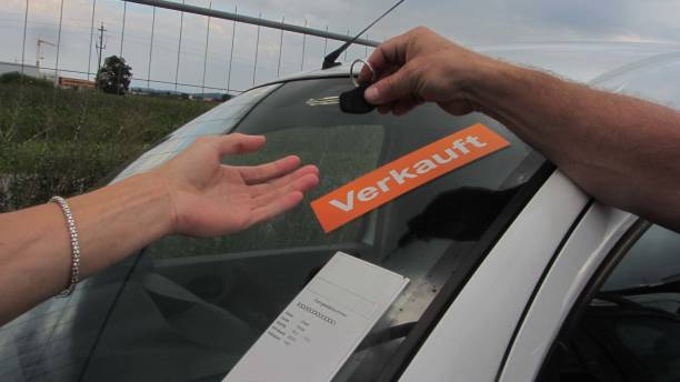 istock key handover on car purchase 1438223264