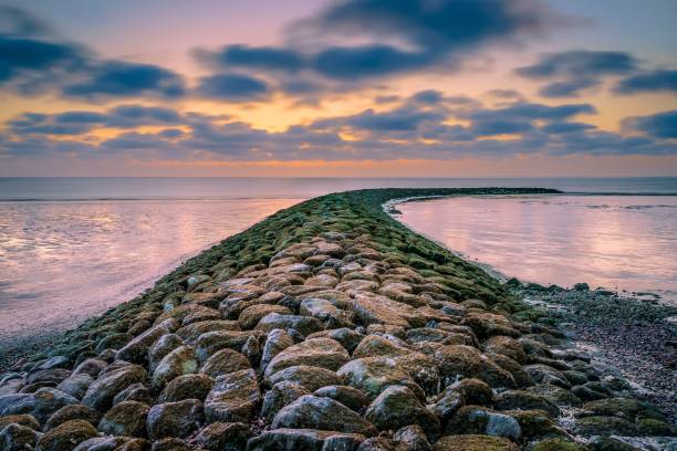 istock Storm breaker with dramatic cloudy sky drifting by 1438223724