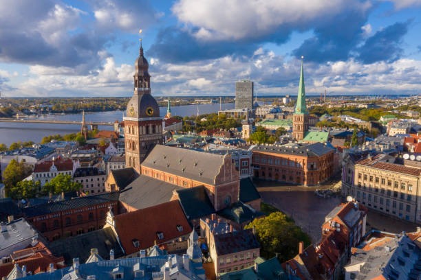 istock Riga Cathedral surrounded by buildings under the sunlight and a cloudy sky in Latvia 1438224424
