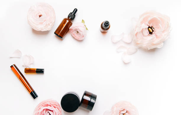 istock facial cosmetics and flowers on a white background. self-care 1438226434