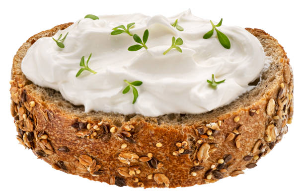istock Rye toasted bread with cream cheese isolated on white background 1438227474