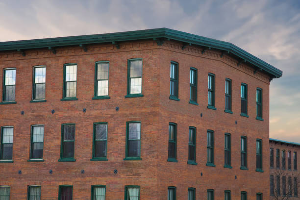 old building corner windows downtown city vintage architecture red brick condominium red brick building corner old architecture ancient factory condominium windows downtown city living historic building stock pictures, royalty-free photos & images