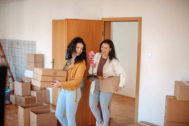 istock Friends moving into new apartment together 1438230155