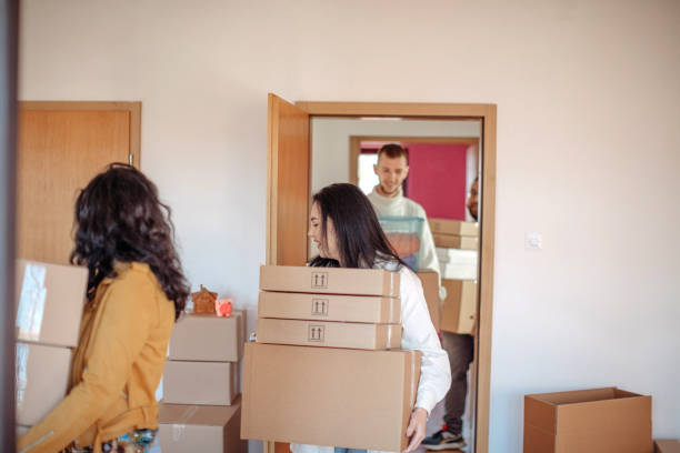 istock Friends moving into new apartment together 1438231025