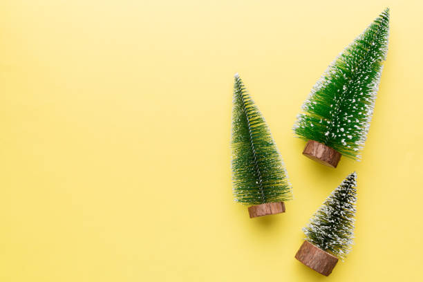 istock Flat lay composition with christmas trees on color background. Top view with copy space 1438231166