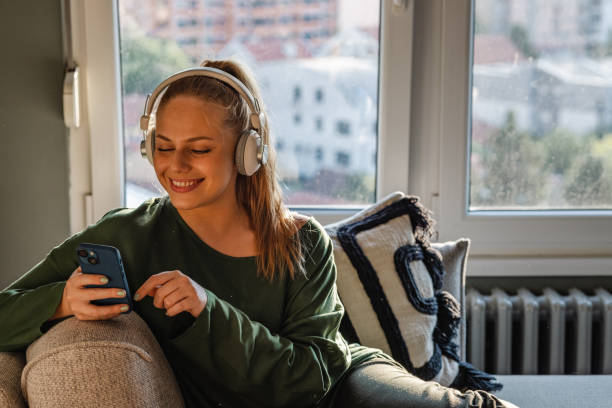 istock Young woman at home using social media 1438232182