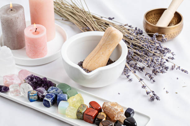 istock Healing reiki chakra crystals therapy. Alternative rituals with gemstones for wellbeing, meditation, destress, relaxation, mental health, spiritual practices. Energetical power concept 1438232292