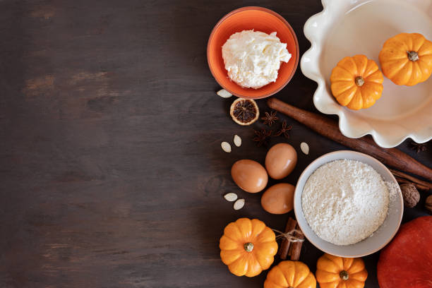 istock Fall pie baking ingredients with pumpkins, nuts, seasonal spices 1438232516