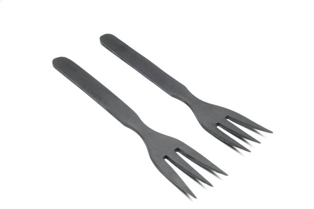 istock Black Wooden fork isolated on white. Cooking utensil 1438239251