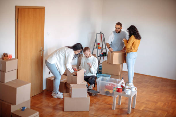 istock Friends moving into apartment together 1438240812