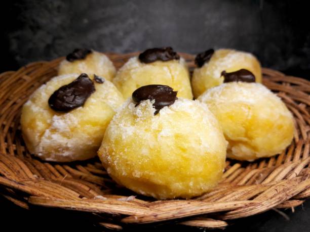 istock close up Homemade bomboloni bread, served as a snack 1438244448