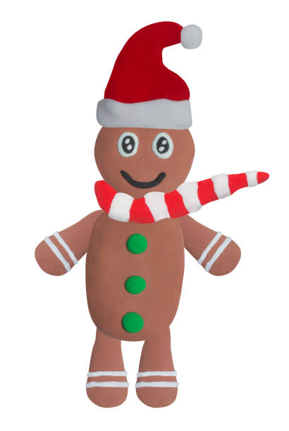 istock Christmas holiday ginger bread man made from plasticine on white background 1438246548
