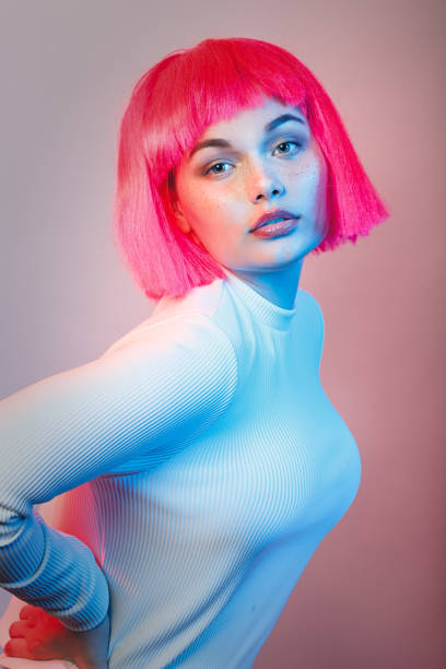 istock girl in red wig 1438248273
