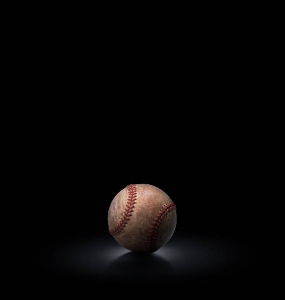 istock baseball ball on black background 1438256223