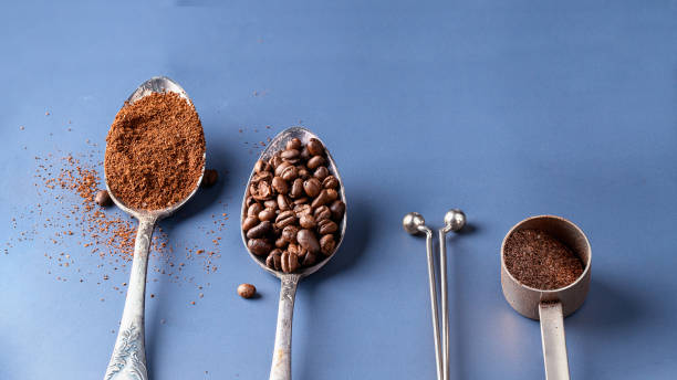 istock Assorted coffee, coffee beans, ground and instant, pon color background.Preparing coffee concept. 1438257631
