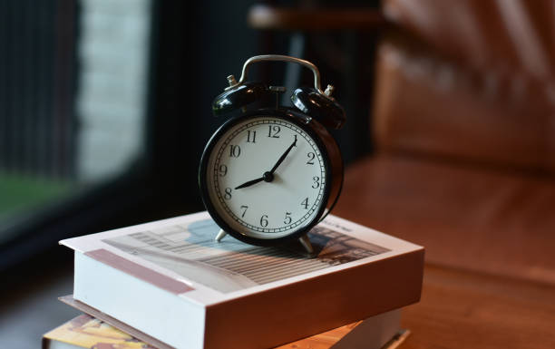 istock The clock is an alarm clock placed on the floor. 1438259048