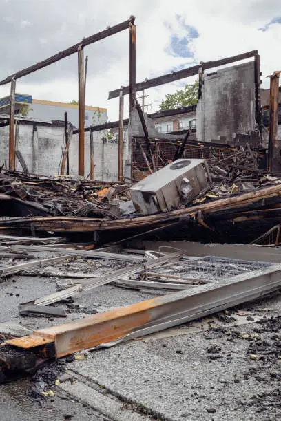 Photo of Building burned to the ground.