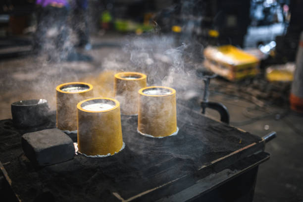 istock Industrial Metallurgy Work. Melted Metal In Casting Molds 1438260474