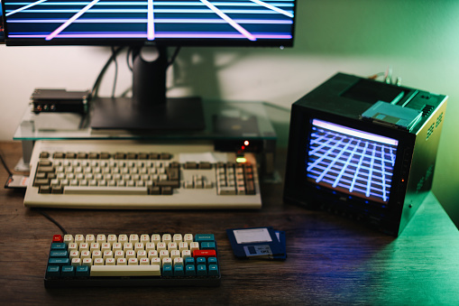 Creating 80s synth wave music and visuals using an old computer, a mechanical keyboard and a professional CRT monitor.