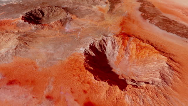 Drone footage of craters on the rock-covered surface of the Mars planet