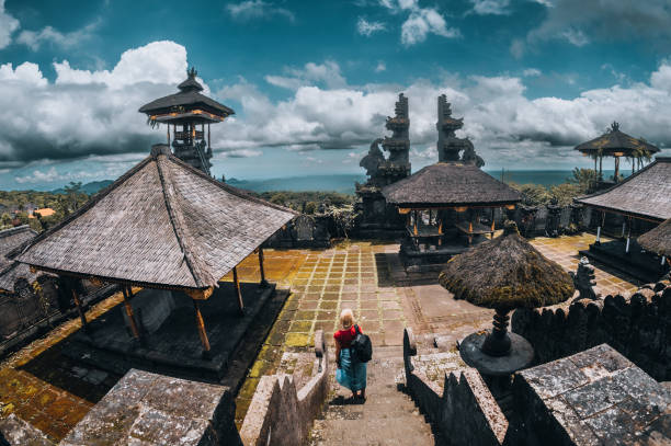 istock Woman Exploring Besakih Temple 1438275339