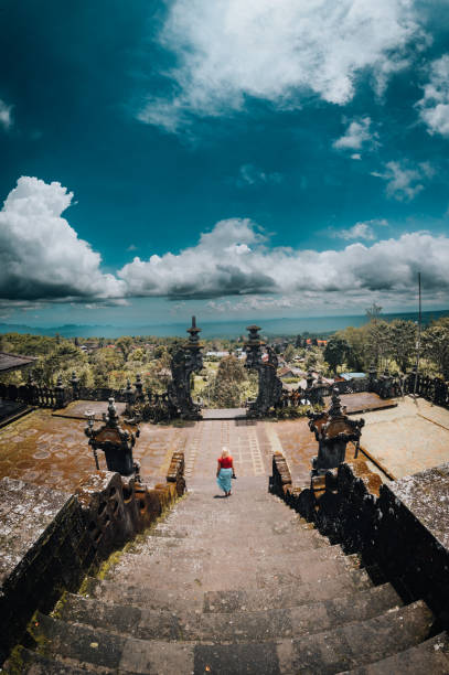istock Woman Exploring Besakih Temple 1438275357