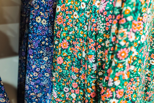 Partial close-up of dress with floral pattern