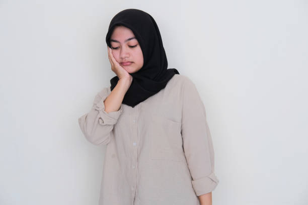 istock Young moslem girl showing gloomy expression 1438281146