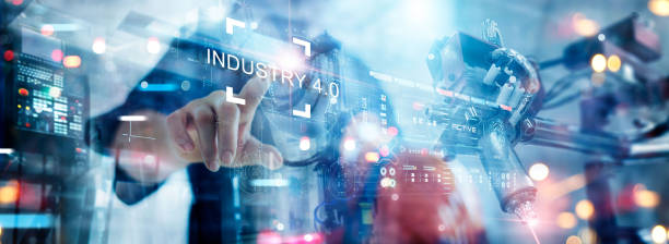 Industry 4.0, software interface of automation manufacturing process of industrial revolution 4.0, Engineer control operation of Robotics arms for smart digital factory production. stock photo