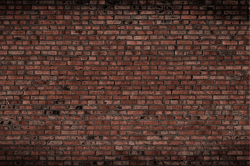Red brick wall aged background design texture