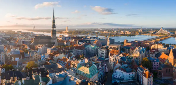 An aerial shot of the old town of Riga in Lativa during a beautiful sunset