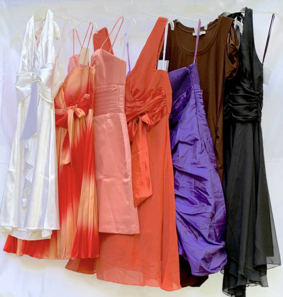 istock Rack of short formal dresses hanging 1438300422