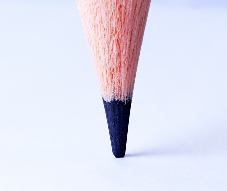 Pencil point close up. Detail view of a blue pencil