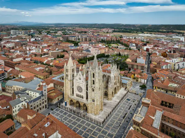 León City View in Summer with old gothic Santa María de Regla de León Cathedral from 13th Century in the downtown city center. Aerial Drone Point of View. Leon Cathedral, León, Castile y León, Spain, Europe