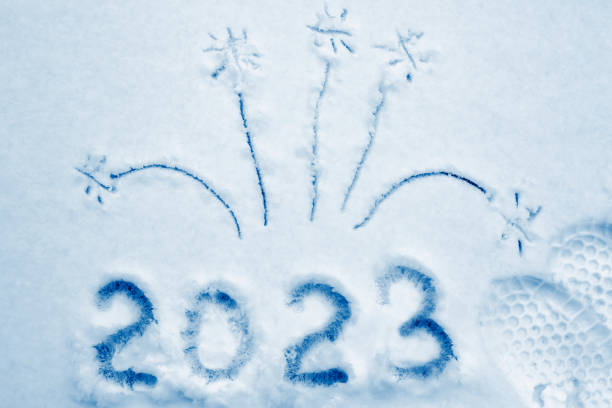New Year 2023 written on the snow stock photo