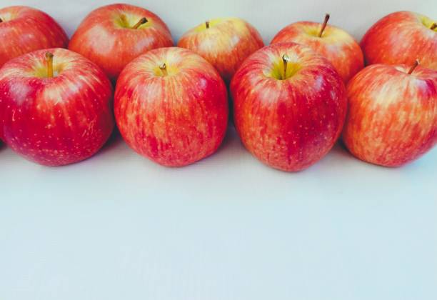 Apples fruit fresh red apple ripe juicyapples whole raw food sweet fresh health beneficial and nutritious malus domestica seb apel apfel Manzana La Pomme tafaha yabloko ringo no mi, la mela, ping guo, hi-res closeup view image stock photo manzanas fruta fresca manzana roja madura jugosas enteros alimentos crudos dulce fresco salud beneficioso y nutritivo malus domestica seb apel apfel manzana la pomme tafaha yabloko ringo no mi, la mela, ping guo, alta resolución primer plano ver imagen fo