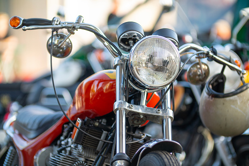 Hamburg, Germany October 30. 2022: Close-up of the front of a historic motorbike parked in the outskirts of Hamburg