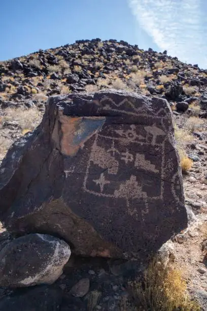 A vertical shot of rock-art at Petroglyph National Monument in Boca Negra Canyon, Albuquerque, New Mexico, USA