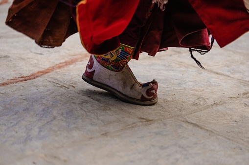 A closeup of a Tibetan Buddhist shoe at Tiji Festival in ancient Lo Manthang, Upper Mustang, Nepal