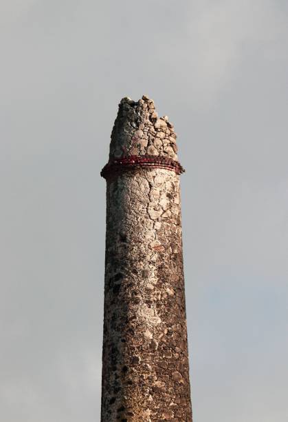 A vertical shot of an old stone tower
