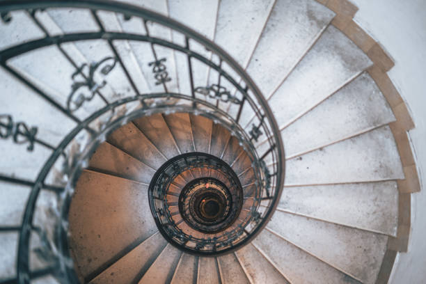 istock Mesmerizing shot of round white stairs 1438318444
