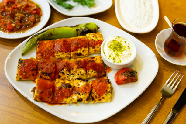 istock Traditional Turkish beyti sarma from grilled ground beef wrapped in flat bread 1438318970