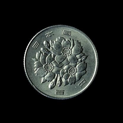 The 1967 Japanese One Hundred Yen coin isolated on the black background
