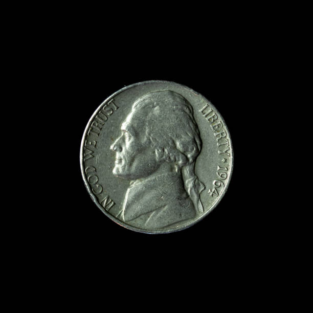 istock 1964 Jefferson Nickel isolated on the  black background 1438319041