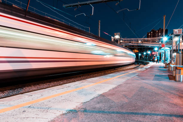 istock Fast train passing through a train station with very high speed 1438319301
