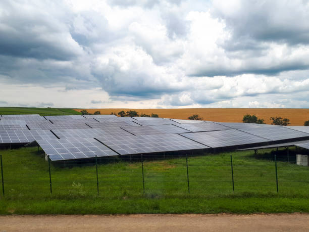 istock Mesmerizing view of solar panels under a cloudy sky 1438320776