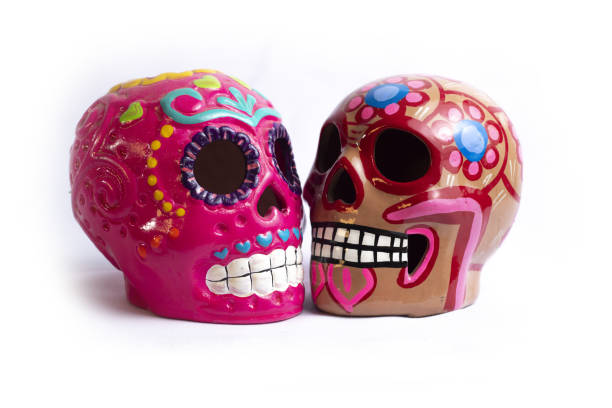 istock Isolated shot of vibrant decorative skull souvenirs 1438320941